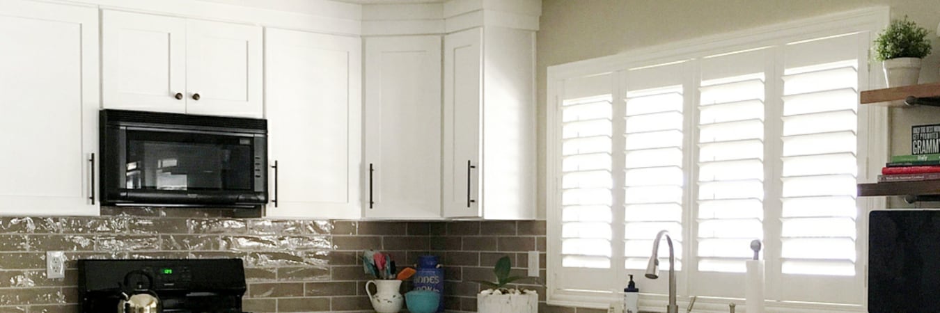 Hidden tilt shutters in a kitchen